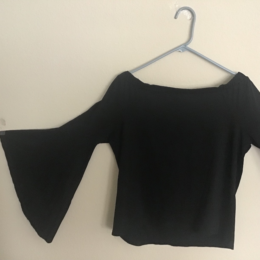 Neiman Marcus Woman’s Knitted Bat Wing Drop Shoulder Black Top